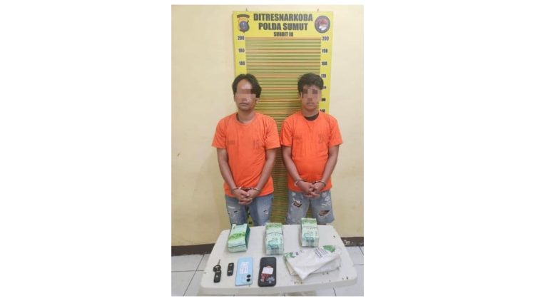 Dua pelaku peredaran ilegal zat keytamine (obat anestesi disosiatif yang kuat) yang ditangkap Polda Sumut. (Foto Ist)