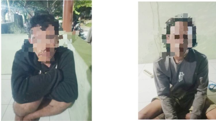 Kedua terduga pelaku pencurian yang dimassakan saat diamankan warga di Jalan Kasad