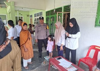 habinkamtibmas Kelurahan Simarimbun Bripka Johannes C. Siregar melaksanakan sambang dan monitoring kegiatan Posyandu Bugenfil di Sidomulyo