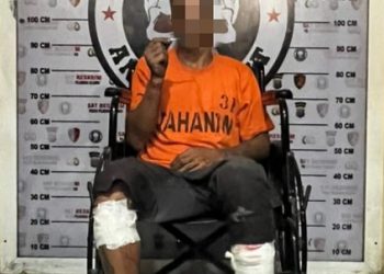 Pelaku Ravel yang ditembak pada kedua kakinya oleh personel Polres Belawan. (Foto Ist)