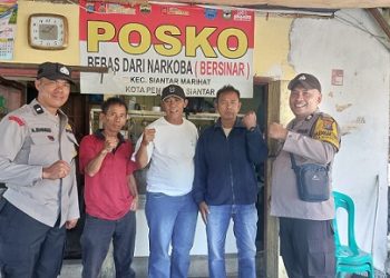 Bhabinkamtibmas Polsek Siantar Marihat Patroli Sampaikan Pesan pesan Kamtibmas di Posko Bersinar Jalan Pisang