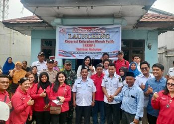 Bhabinkamtibmas AIPTU J. Hutahuruk menghadiri undangan kegiatan launching Sembako KKMP