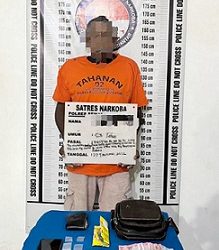 Tersangka MH dan barang bukti