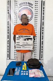 Tersangka MH dan barang bukti