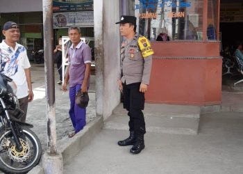 Bhabinkamtibmas Kelurahan Kahean AIPDA H.E. Pane laksanakan sambang di Loket Bus Intra