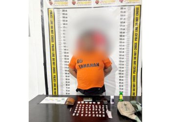 Tersangka K dan barang bukti