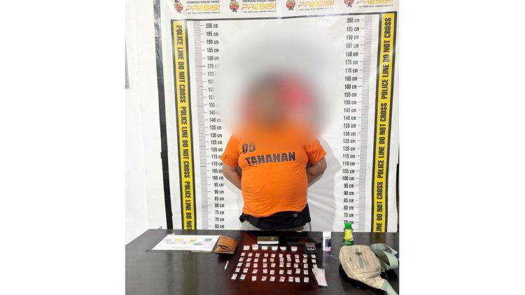 Tersangka K dan barang bukti