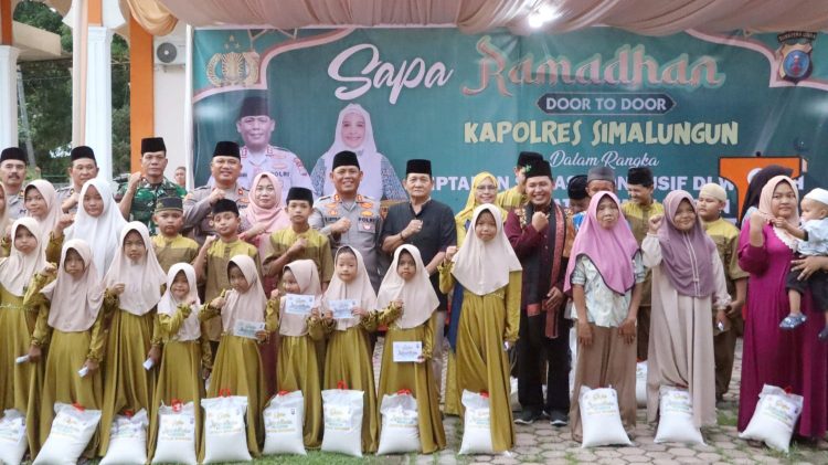 Kapolres Simalungun Ajak Masyarakat Bersatu Perangi Narkoba saat menyantuni anak yatim