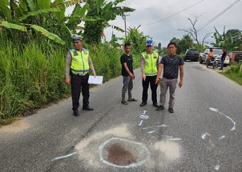 Personil Unit Gakkum Sat Lantas Polres Simalungun saat olah TKP