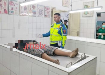 Jenajah Waiter Cafe, AAFG alias Bizar saat di visum diruangan jenajah RSUD dr Djasamen Saragih