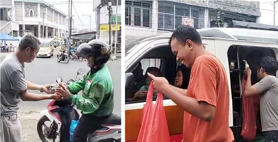 Direksi Angkota CV SKB, Francis Nababan saat berbagai takjil kepada penumpang dan masyarakat