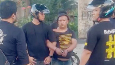 Pengedar narkoba dikawasan bantaran rel keret api Gaharu yang diringkus polisi. (Foto Ist)