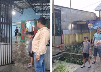 Bhabinkamtibmas Kelurahan Simarimbun Bripka Johannes C. Siregar respon cepat tanggap bencana alam banjir di Jalan Parapat KM 4,5