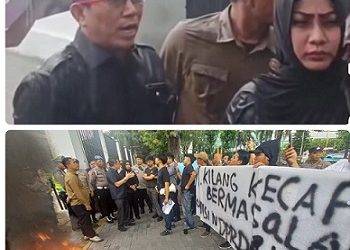 Ketua Komisi 4 DPRD Medan Paul Mei Anton Simanjuntak SH didampinggi anggota Lailatul Badri saat menerima massa pengunjuk rasa soal limbah pabrik kecap Cap Hati Angsa - PT Kilang Kecap Angsa di Jalan Bono, Kecamatan Medan Timur ditengah guyuran hujan. (Foto Romulo)