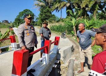 Kapolres Simalungun, AKBP Marganda Aritonang, S.H. S.I.K. M.M pengecekan hasil pembangunan Jembatan Merah Putih Presisi di Jorlang Hataran