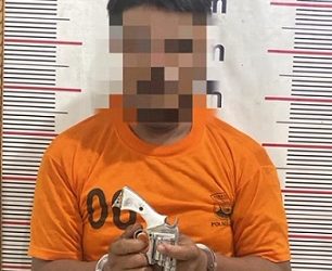 Pelaku curas yang diringkus pihak Polres Langkat turut disita senjata api rakitan. (Foto Ist)