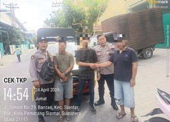 Kanit Samapta IPDA Irwan Saragih SH saat mediasi kedua belah pihak 