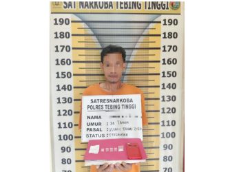 Tersangka ABY dan barang bukti