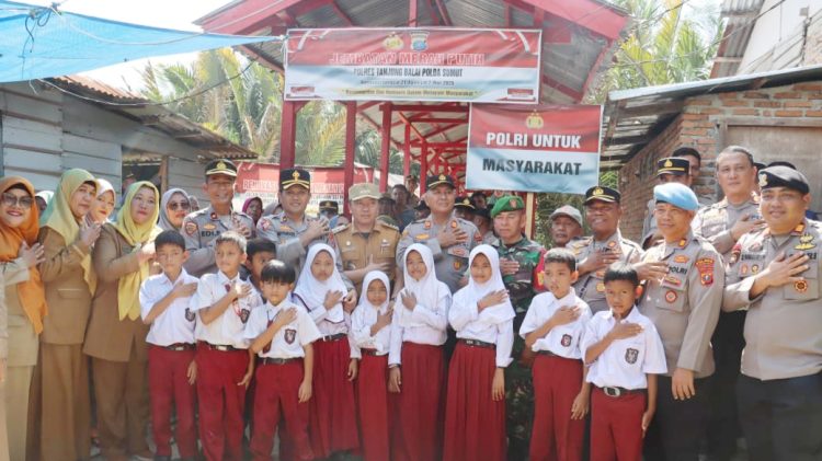 Polres Tanjung Balai Serahkan Kembali Jembatan Merah Putih untuk Warga Sei Merbau