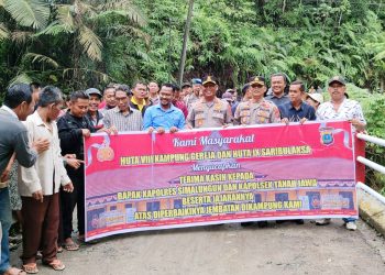 Kapolres Simalungun, AKBP Marganda Aritonang, S.H. S.I.K. M.M meresmikan perbaikan Jembatan Merah Putih Presisi di Bah Bolum