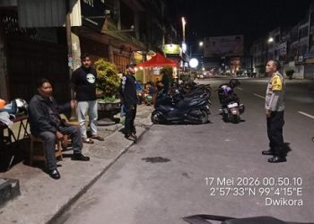 Personil piket Polsek Siantar Barat saat cek TKP dijalan Sutomo tidak temukan balap liar