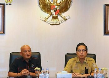 Ketua Pansus Penertiban Aset Daerah DPRD Kota Medab, Robi Barus - Wali Kota Medan Rico Waas.(Foto Ist)