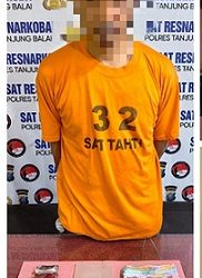 Tersangka MY dan barang bukti yang ditangkap Sat Resnarkoba Polres Tanjung Balai