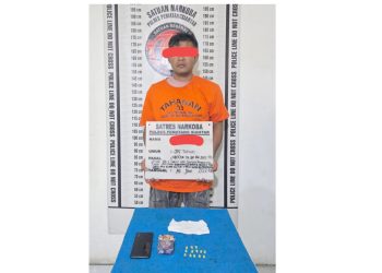 Tersangka SR dan barang bukti