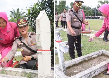 Kapolres Pematangsiantar AKBP Sah Udur T. M. Sitinjak, S.H. S.I.K. M.H dan Kapolres Simalungun AKBP Marganda Aritonang S.H. S.I.K. M.M saat tabur bunga di Makam Pahlawan