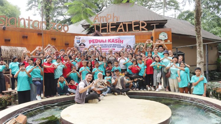 Kapolres Pematangsianțar AKBP Sah Udur T.M. Sitinjak SH. SIK. MH kunjungan dan rekreasi bersama anak Panti Asuhan Elim ke Taman Hewan