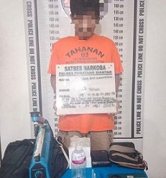 Tersangka JBS dan barang bukti
