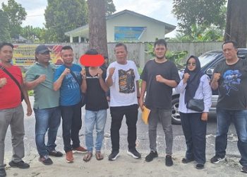 Pelaku MIR diapit Kanit Reskrim IPDA B. Situngkir SH bersama Tim Opsnal