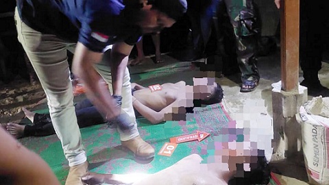 Inafis Polres Simalungun AIPD Sujid Saputra saat evakuasi kedua korban tenggelam