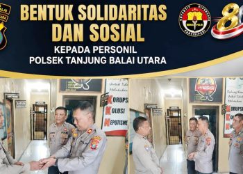 Kapolsek TBU IPTU Sawal Simanjuntak, S.H memberikan santunan dan tali asih kepada AIPDA R.J.W. Sagala