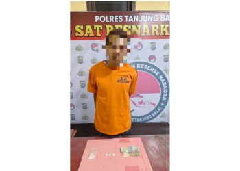 Tersangka MR alias Bul dan barang bukti