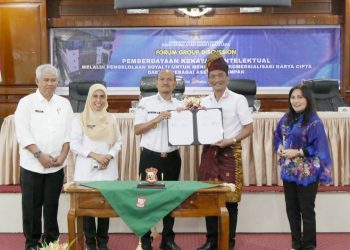 Wali Kota Tanjungbalai Mahyaruddin Salim dan Kepala Kanwil Kemenkum Sumut Ignatius Mangantar Tua Silalahi Penandatanganan Nota Kesepahaman