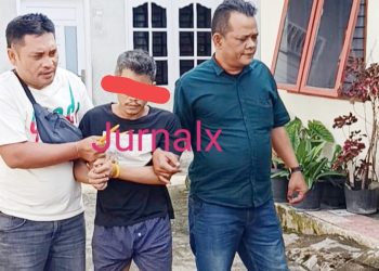 Tersangka KHH alias Kisul saat ditangkap Kanit Reskrim IPDA Indrawan S.Sos bersama Tim Opsnal