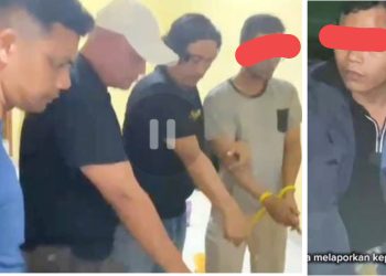 Kedua pelaku Curat saat diapit Kanit Reskrim Polsek Tanah Jawa IPTU Fritsel G. Sitohang, Panit 2 IPDA Fendi Manullang dan Tim Opsnal