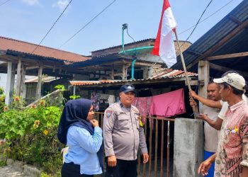 Polsek Datuk Bandar Ajak Warga Pasang Bendera Merah Putih