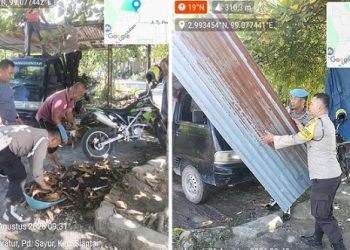 Personil Polsek Siantaar Martoba dipimpin Kanit Reskrim IPDA Leo A. Tambunan SH dan PS. Kanit Provos AIPTU Budi G.B. Damanik gotong royong bersama Lurah dan mayarakat di Perumahan Maranata