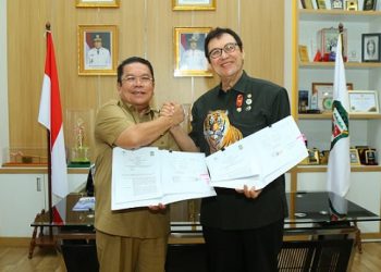 Wali Kota Pematangsiantar Wesly Silalahi SH MKn menandatangani Perjanjian Kerja Sama Pemko Pematangsiantar dengan PT Unitwin Indonesia tentang Pemanfaatan Taman Hewan Pematangsiantar.