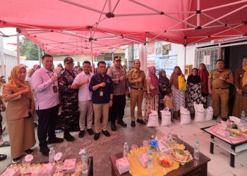 Wakapolres Tanjungbalai, Kompol Tony Simanjuntak, SH hadiri Penyerahan Bantuan Pangan Beras di Teluk Nibung