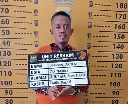 Pengedar uang palsu yang ditangkap polisi. (Foto Ist)