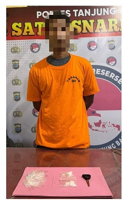 Tersangka AF alias An dan barang bukti