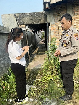 personil piket Polseķ Siantar Martoba melakukan pengecekan TKP dugaan Pencurian di Jalan Sumber Jaya