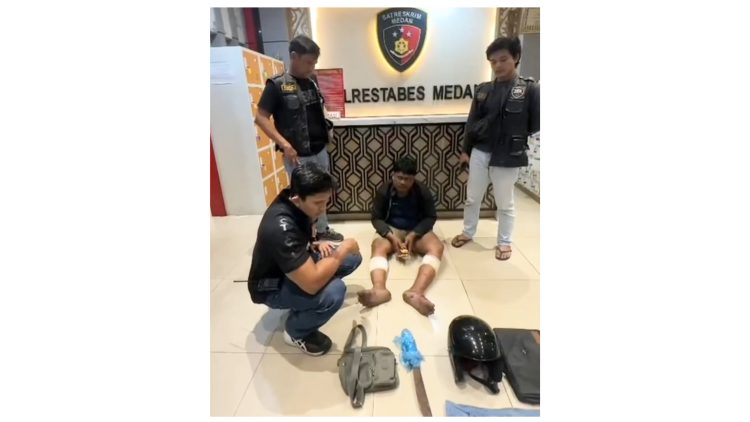 Pelaku jambret pakai jaket ojol yang ditangkap personil Polrestabes Medan. (Foto Ist)