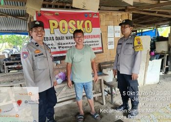 Piket Bhabinkamtibmas Polsek Sianțar Marihat Polres Pematangsiantar melaksanakan patroli Kampung Bebas dari Narkoba (KBN) di Jalan Bahkora II