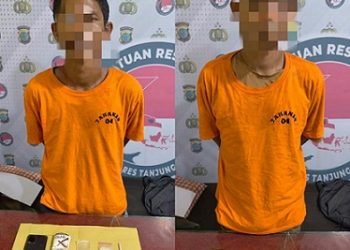 Kedua pengedar sabu dan barang bukti diamankan di Sat Resnarkoba Polres Tanjungbalai