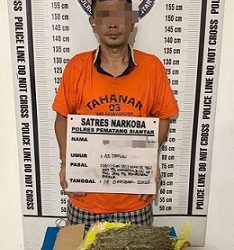 Tersangka YHP dan barang bukti