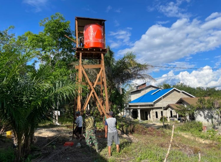 Tim Satgas TMMD bersama Warga setempat diketahui telah merampungkan pekerjaan pembuatan sumur bor.